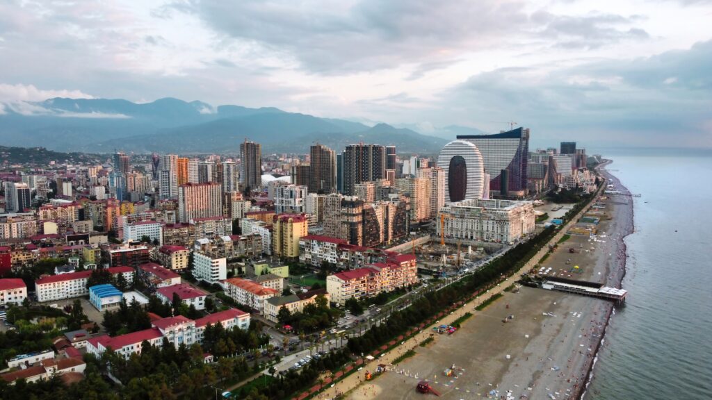 aerial drone view coastline batumi georgia black sea buildings greenery mountains x